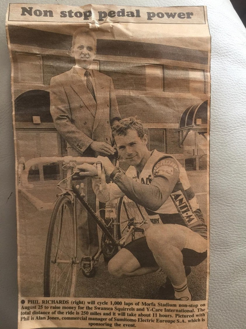Newspaper photograph of Phil before his 12-hour, 250-mile cycling challenge.