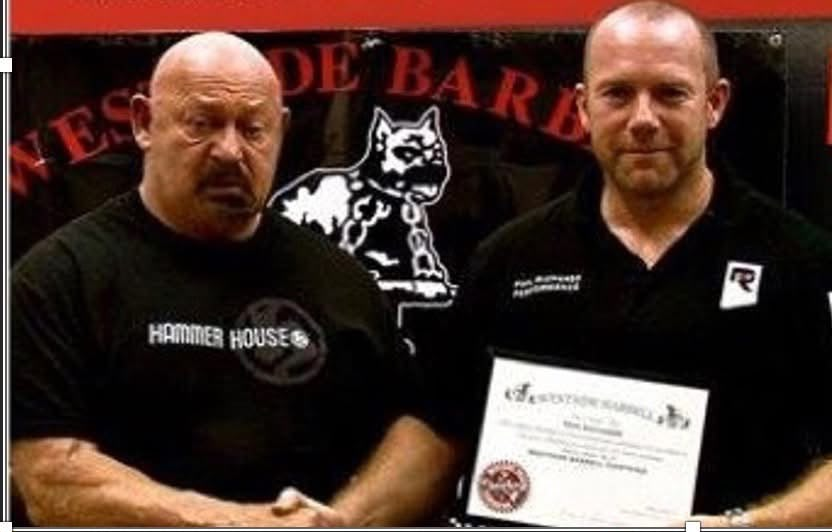Phil receiving his Westside certificate from Louie Simmons.