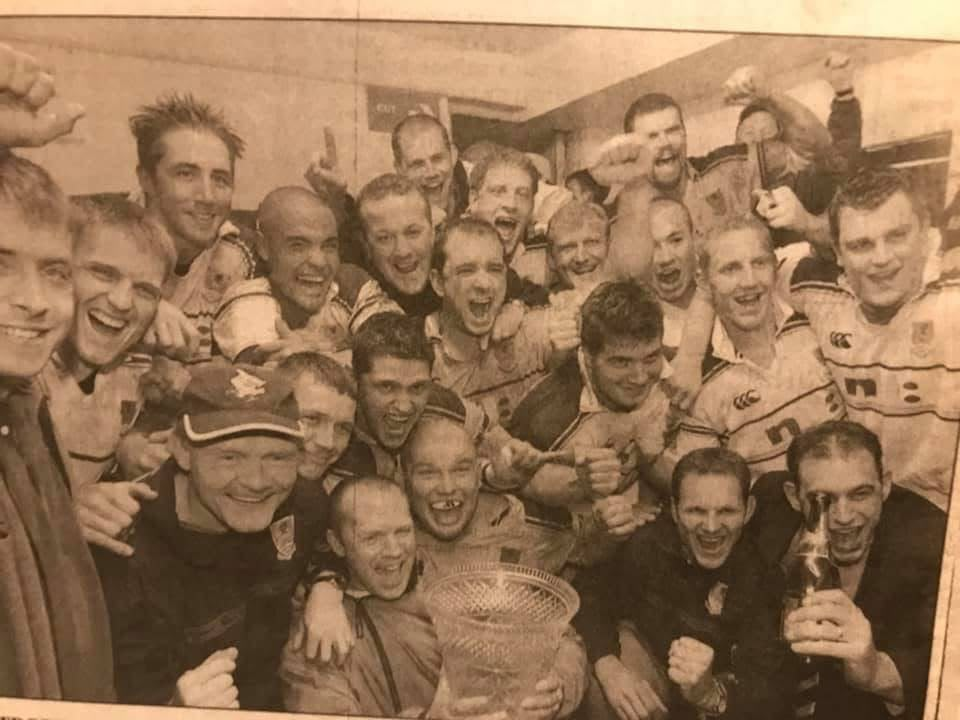 Phil holding the cup after winning the league title with Swansea RFC.
